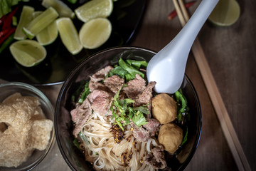 Thai style noodle blood soup,boat noodle,delicious dish,famous Thai noodle soup. Thai peoples call Boat Noodles. Close up or selective focus 