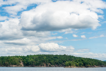 View over Inlet, ocean and island with mountains in beautiful British Columbia. Canada.