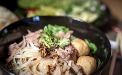 Thai style noodle blood soup,boat noodle,delicious dish,famous Thai noodle soup. Thai peoples call Boat Noodles. Close up or selective focus 
