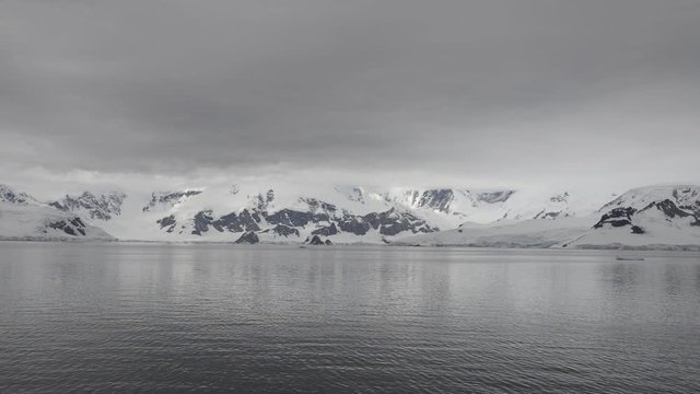 Antarctic seascape with iceberg at sea made from expedition vessel