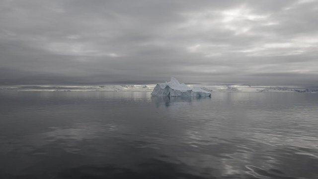 Antarctic seascape with iceberg at sea made from expedition vessel