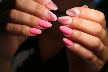 Closeup photo of a beautiful female hands with elegant manicure