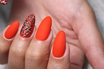 fashionable beige manicure with a silver design