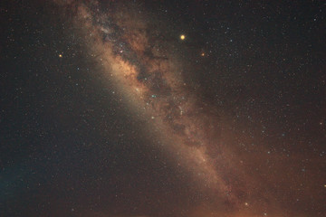 Clearly milky way galaxy rising in Mantanani island, Sabah Malaysia. Image contains noise, grain, blur and soft focus due to high ISO, long exposure and wide aperture.