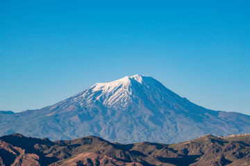 Breathtaking view of Mount Ararat, Agri Dagi, the highest mountain in the extreme east of Turkey accepted in Christianity as the resting place of Noah's Ark, a snow-capped and dormant compound volcano