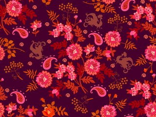 Fantasy oriental seamless paisley pattern with vintage flowers and silhouettes of peacocks on dark purple background. Print for fabric, wallpaper.