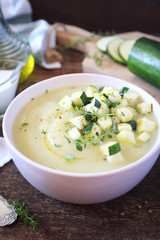 Zucchini vegetable cream soup, thyme and olive oil dressing