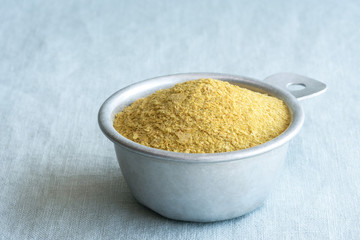 Nutritional Yeast in a Measuring Cup