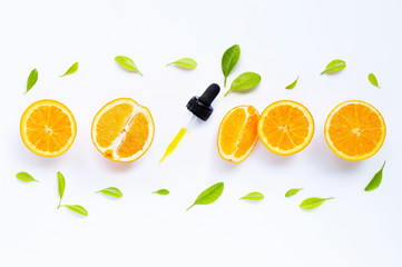 Citrus fruits oil natural orange Vitamin C with fresh orange and green leaves on white