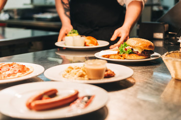 Food orders on the kitchen table in the restaurant
