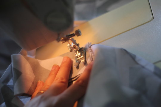 man working with sewing machine