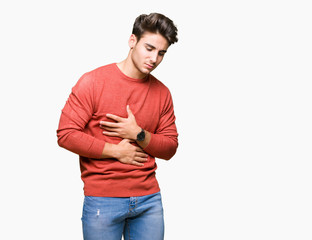Young handsome man over isolated background with hand on stomach because nausea, painful disease...