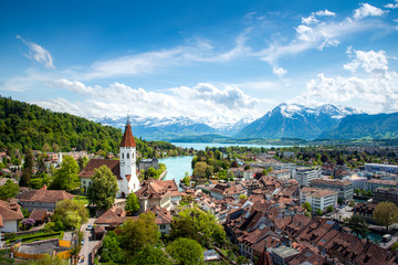 Panorama of Thun city  in the canton of Bern with Alps and Thunersee lake, Switzerland. - obrazy, fototapety, plakaty