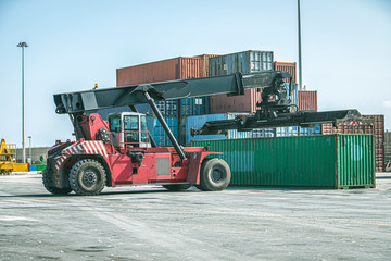 Forklift for industrial containers inside a port