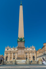 Fototapeta na wymiar Vatican Obelisk and the St. Peter's Basilica in the Vatican
