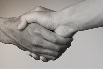 People with their hands together