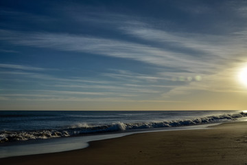 sunset landscape on the beach with bokeh lights