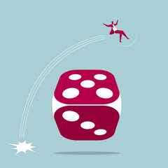 Businessman jumps over the dice. Isolated on blue background.