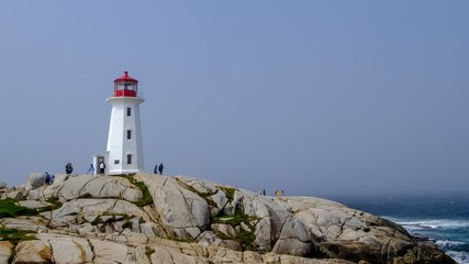 Fototapeta na wymiar lighthouse on coast of sea