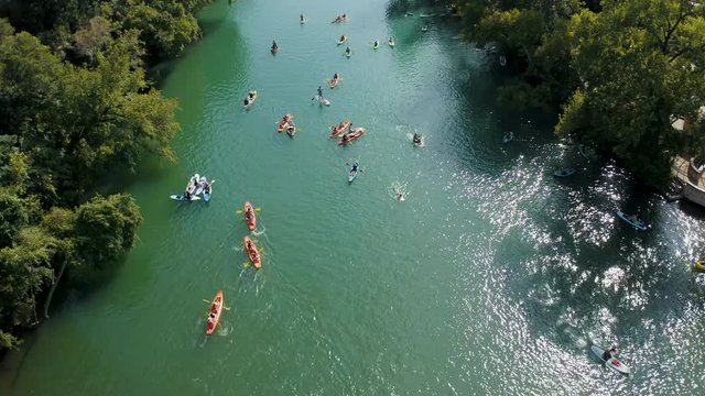 Cinematic 4K Aerial Footage of people in Kayaks on a Creek