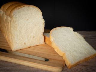 Loaf of bread on a wooden table