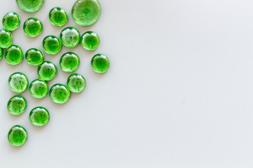 Bright stones on gray background top view mock up