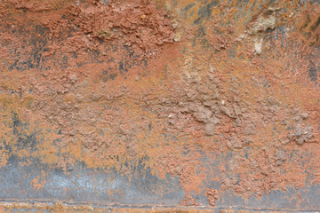 some dirt on iron plate of tractor.