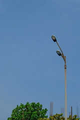 street lamp on blue sky