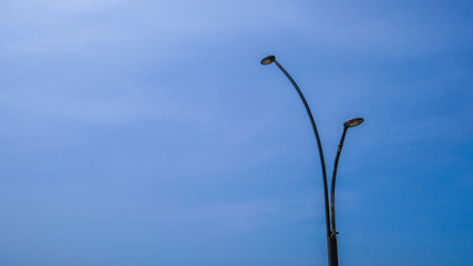 Old Street light with blue sky
