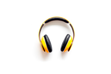Audio listening with wireless headphones on white background top view space for text