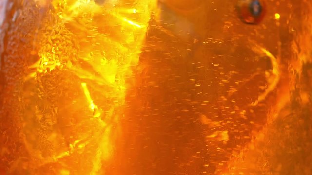 Refreshing orange drink in the sun - 180fps