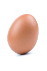 Single brown eggs isolated from white background.