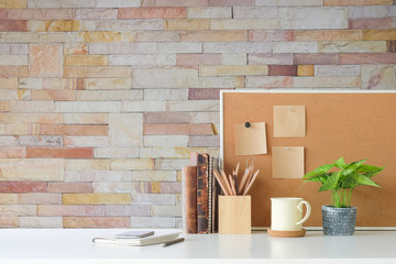 Obraz na płótnie Canvas Mockup workspace desk and copy space books,plant and coffee on white desk.