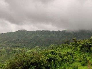 landscape with mountains and clouds