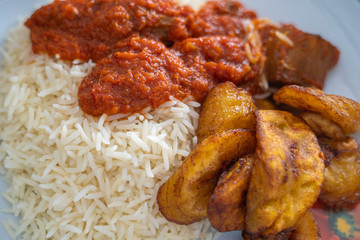 Nigerian Rice and Plantain - Dodo - with spicy Tomato Pepper Stew