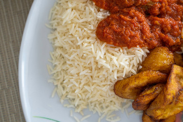 Nigerian Rice and Plantain - Dodo - with spicy Tomato Pepper Stew