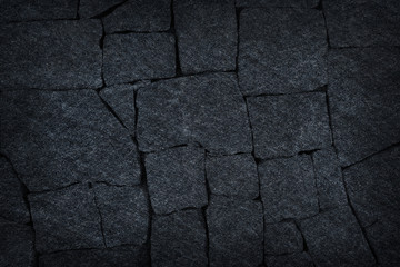 Dark grey stone path black slate stone background or texture