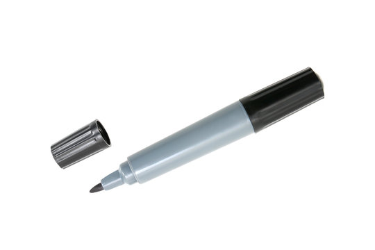 Black marker pen with cap off on a white background with clipping path