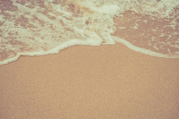 Beach sand and ocean waves