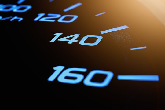 Speed meter of a car close up, Pointer indication on speed bar.