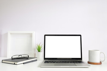 Workspace desk and laptop. copy space and blank screen. Business image, Blank screen laptop and supplies.