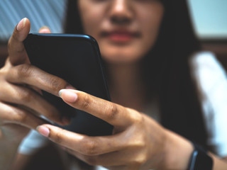 woman using smartphone tablet