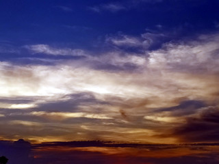 Naklejka na ściany i meble multi colored clouds in the evening sky
