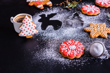 Christmas homemade gingerbread cookies on a dark background