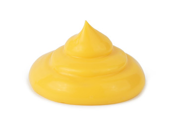 Drop of tasty yellow cheese sauce on a white background