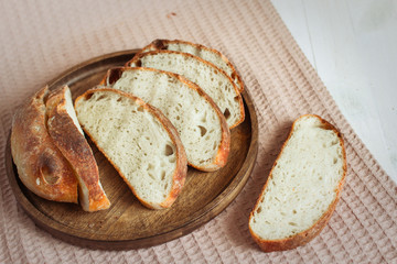 French bread. HOMEMADE BREAD ON WHEAT SOURDOUGH