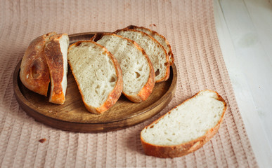 French bread. HOMEMADE BREAD ON WHEAT SOURDOUGH