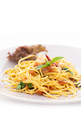 Delicious spaghetti served on white plate