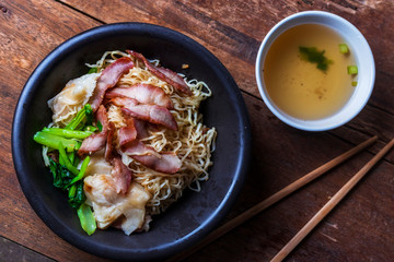 Traditional Thai egg noodles on wooden table top