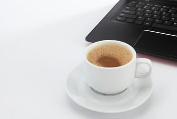 cup of coffee and laptop